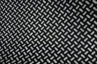 Taustakangas liukueste musta valkoiset pilkut